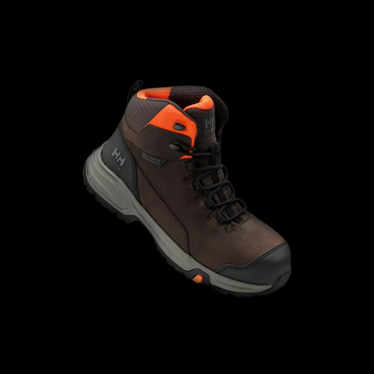 Floating Helly Hansen manchester work shoe in a dark environment